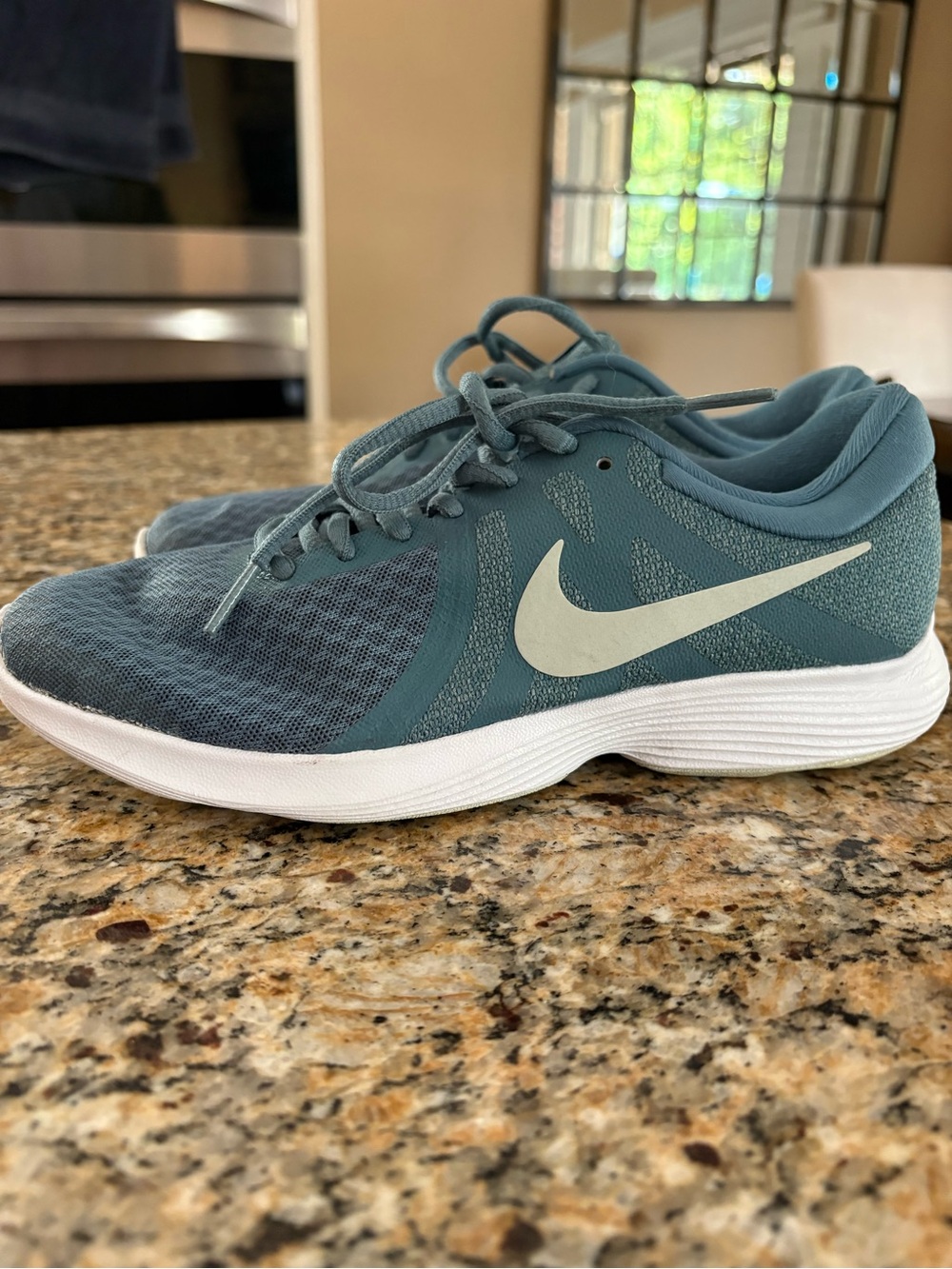 Nike Teal Lace-Up Athletic Sneakers with White Swoosh